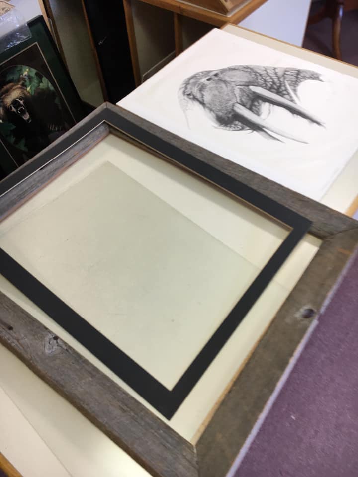 The process of framing art.