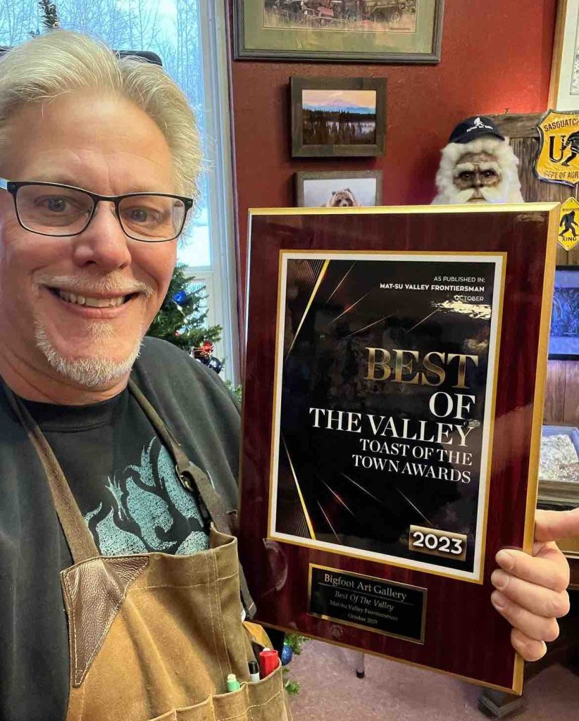 RobRoy displaying the Best Of The Valley plaque.